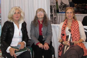 Sharon surrounded by authors Bianca and Bruna